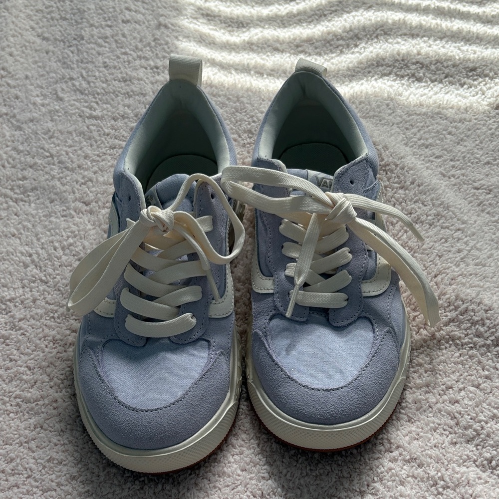 Light purple Vans sneakers